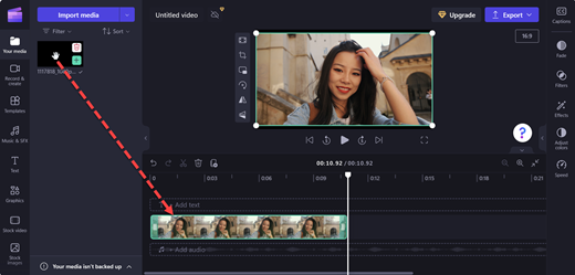 A screenshot of a Clipchamp editor's page showing drag-and-drop action on the selected video to the timeline.